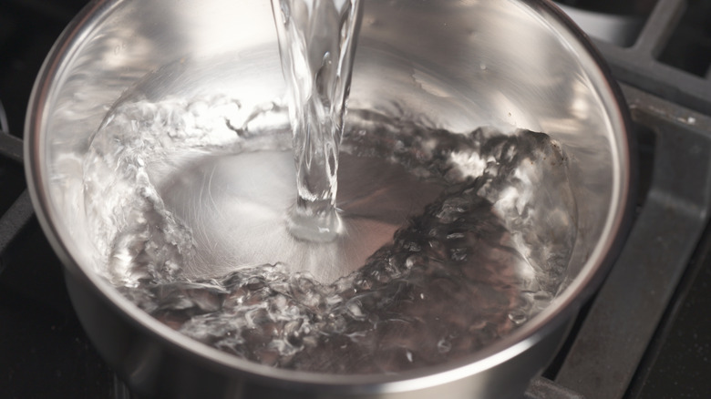 water pouring into pan