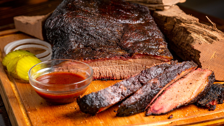 sliced brisket on cutting board