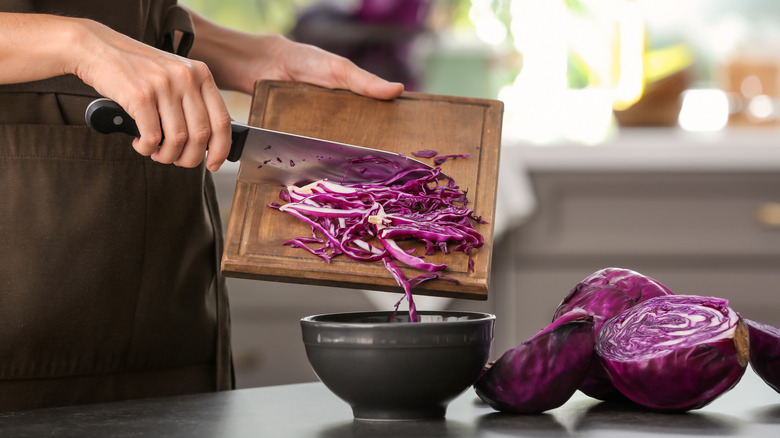 Purple cabbage on cutting board