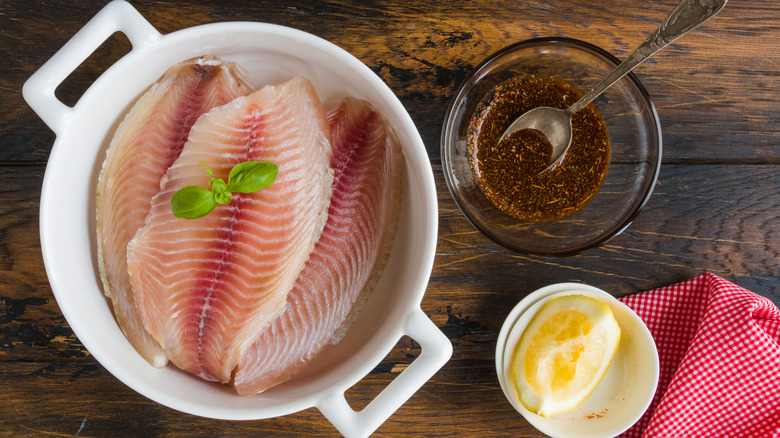 Tilapia pieces in marinade