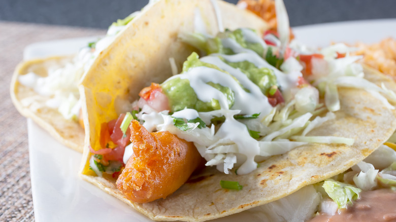 Close up fish taco with crema