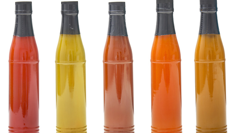 Bottles of different colored liquids