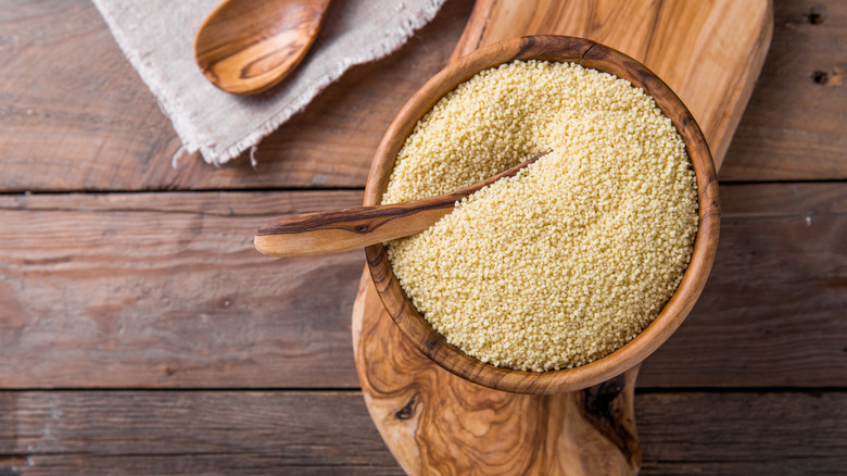 couscous in wooden bowl