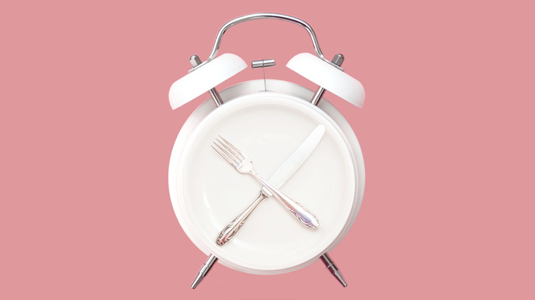 alarm clock with cutlery