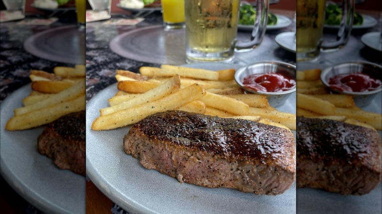 Steak and fries at Outback Steakhouse