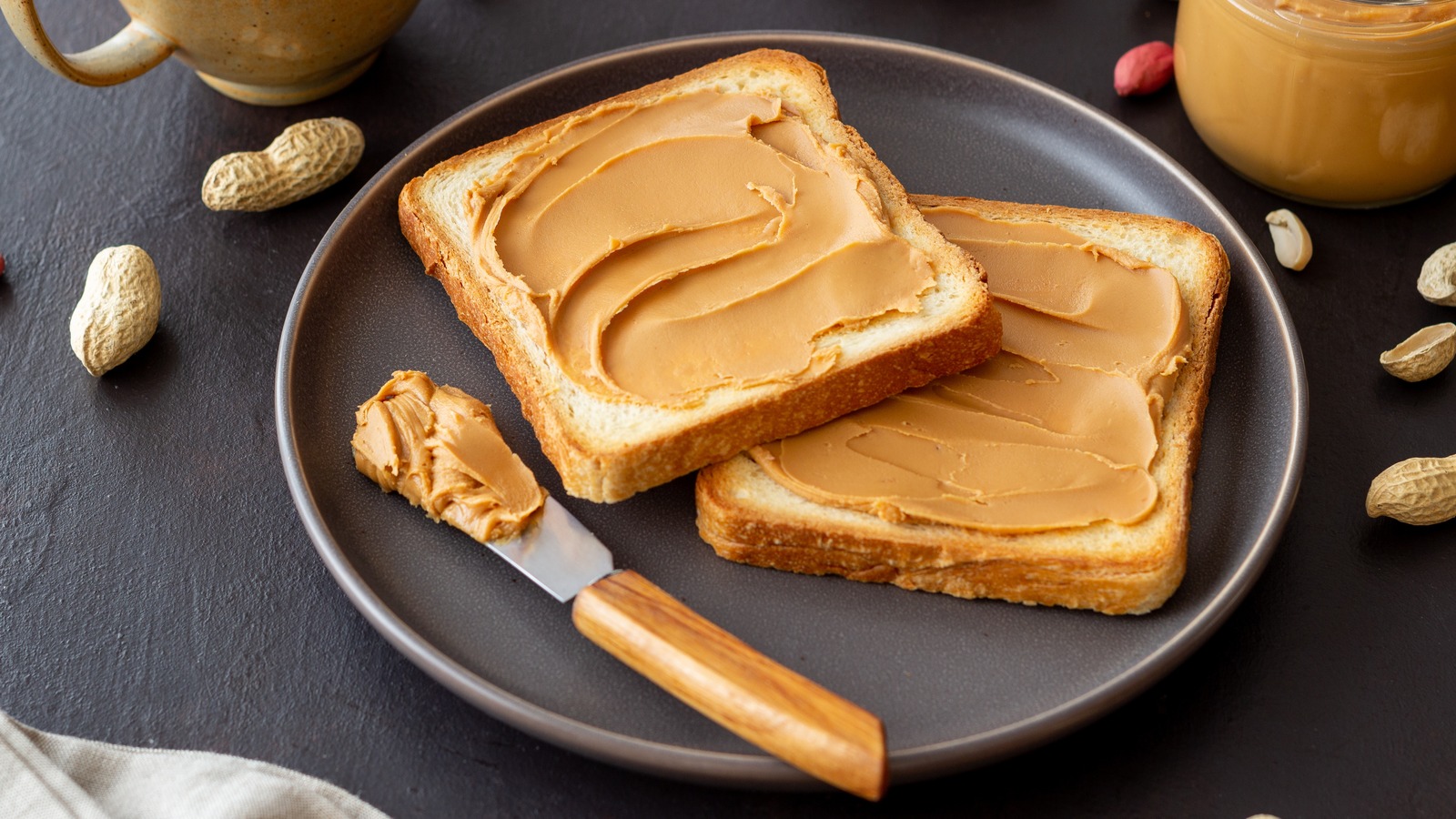 https://www.thedailymeal.com/img/gallery/11-of-the-unhealthiest-store-bought-peanut-butters/l-intro-1698439499.jpg