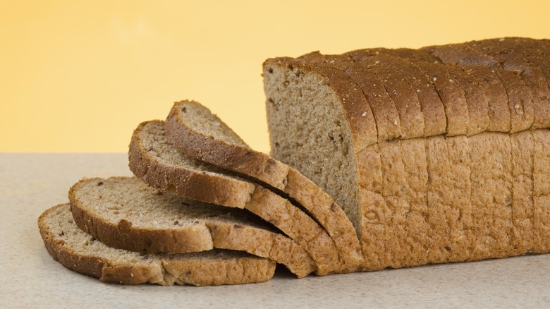 A sliced whole wheat loaf