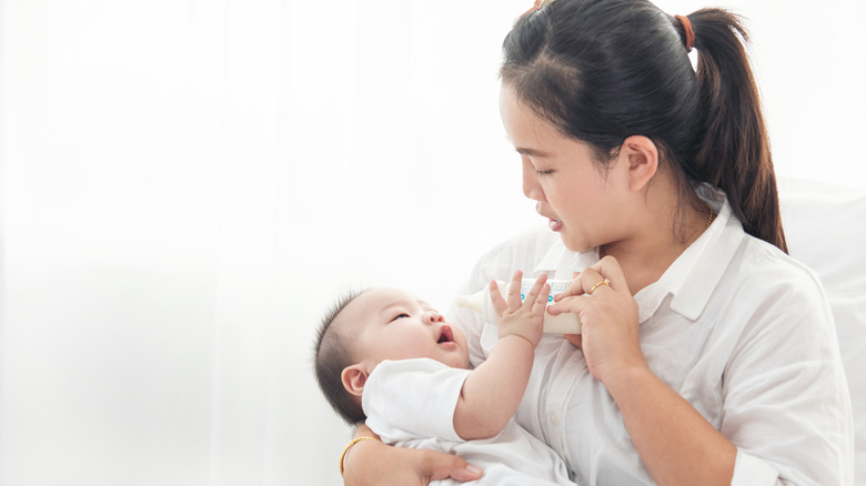 mother feeding baby