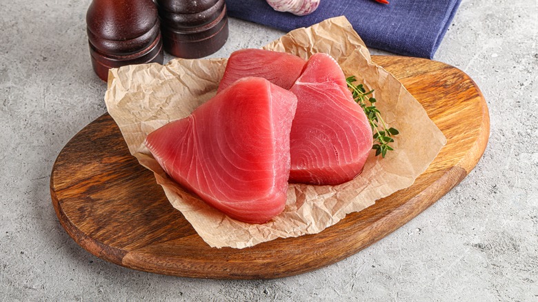Raw tuna on a board