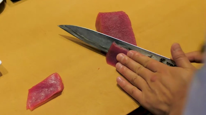 Chef cutting tuna at Nobu