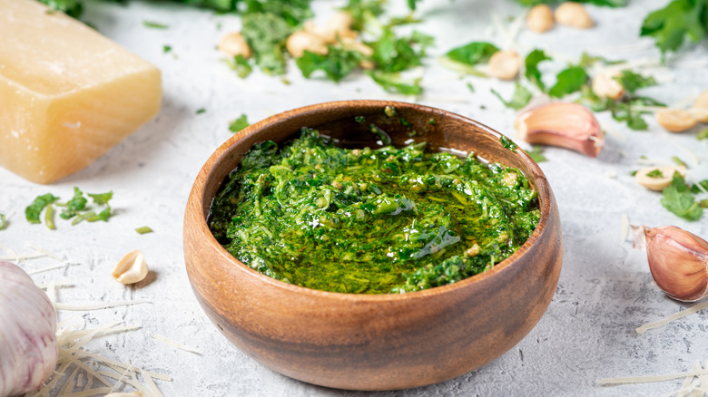 Pesto sauce in wood bowl