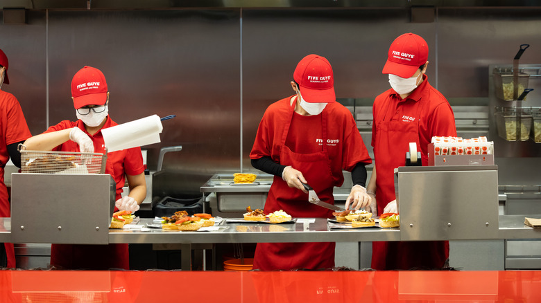 Five Guys staff in uniform 