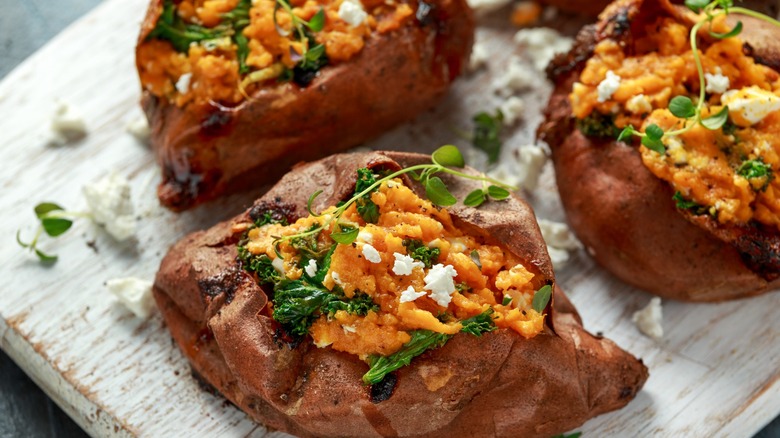 Baked sweet potatoes on board