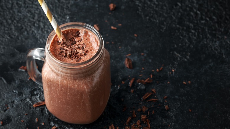 Chocolate smoothie with straw