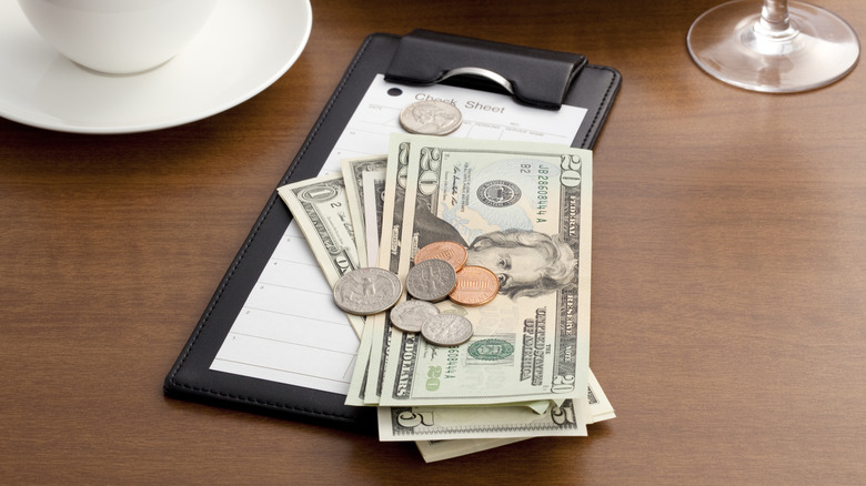 cash and coins on table