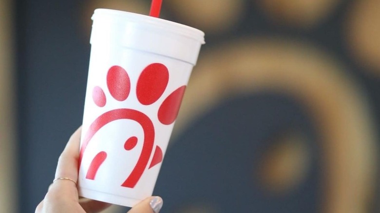 Hand holding Chick-fil-A cup