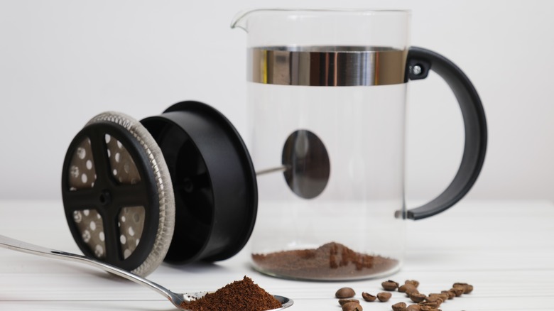 French press with ground coffee