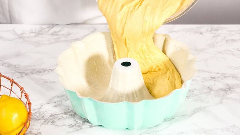 filling Bundt pan with batter