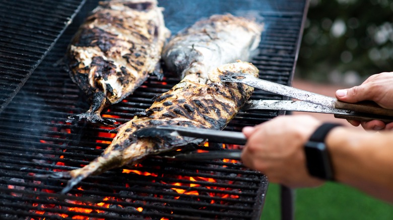 Grilling fish outdoors