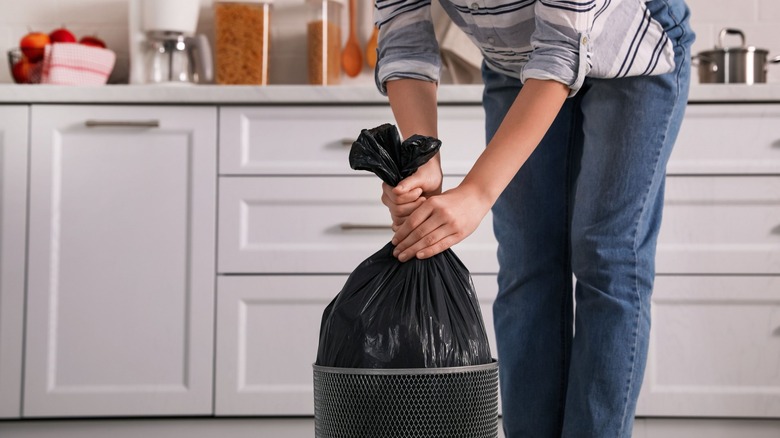 Person taking out the trash