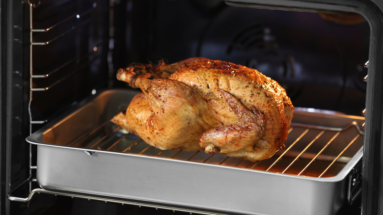 Roast chicken being broiled