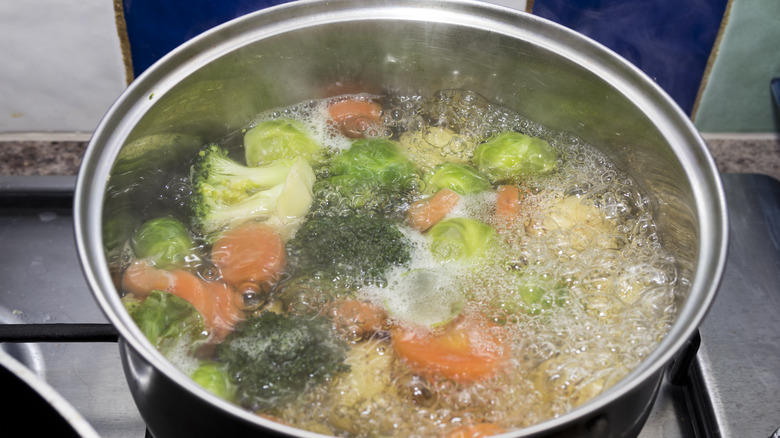 Blanching vegetables in saucepan