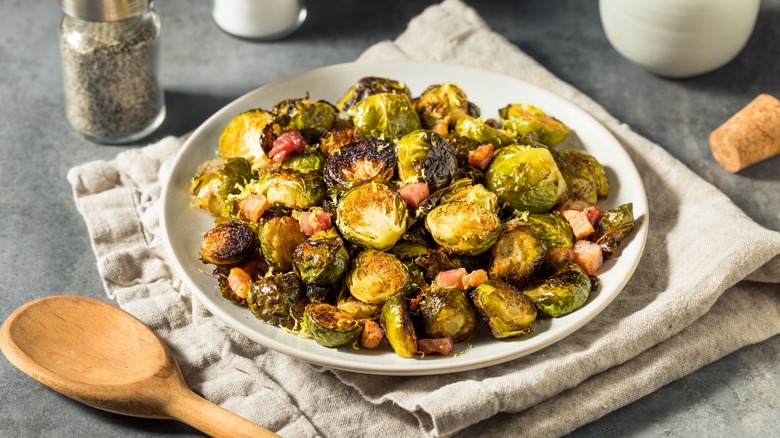 Roasted Brussels sprouts on white plate