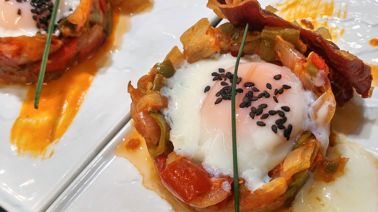 Poached eggs topped with seeds