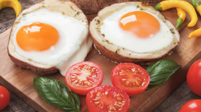 Baked potatoes with poached eggs