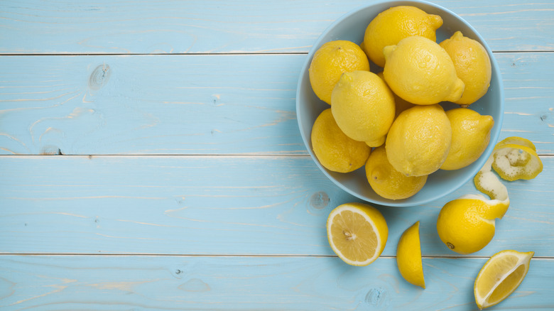 Lemons in a blue bowl