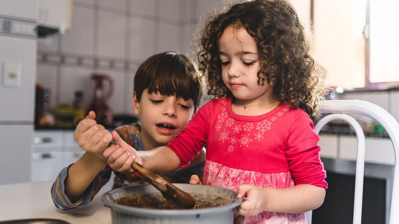 Kids mixing cake batter