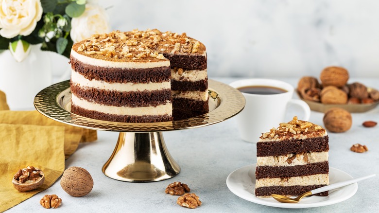 chocolate cake topped with nuts 