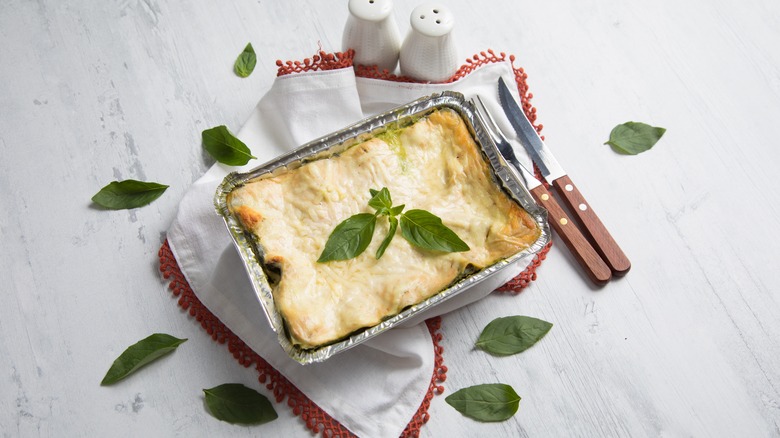 frozen lasagna in metal tray