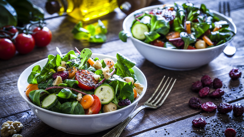 two bowls of salad