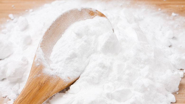 spoon in baking soda pile