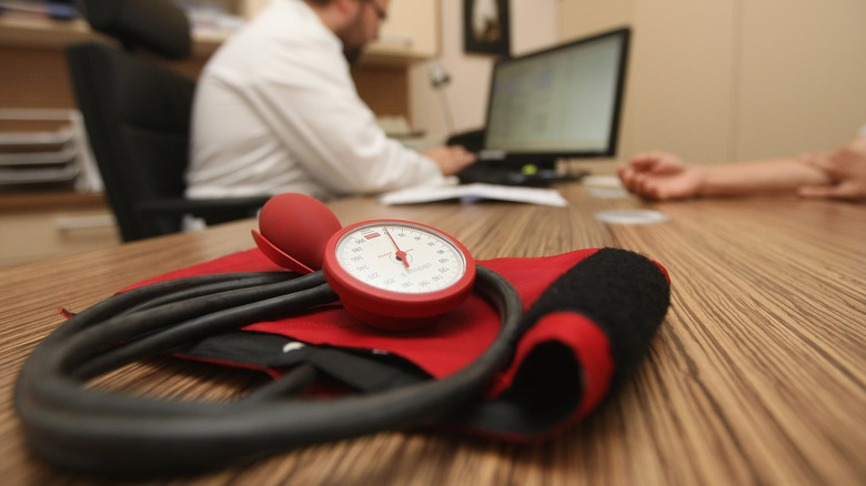 Blood pressure monitor on desk