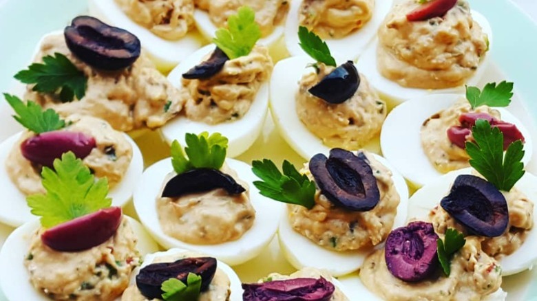 Deviled eggs with olives
