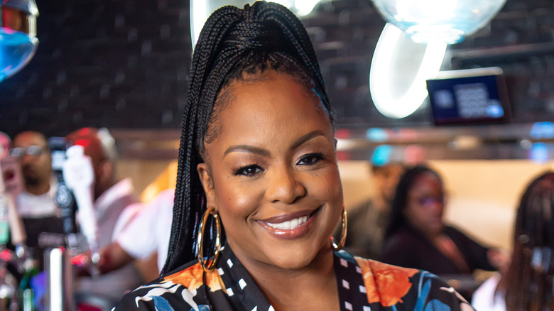 Kardea Brown wearing gold earrings