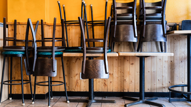 chairs stacked in restaurant