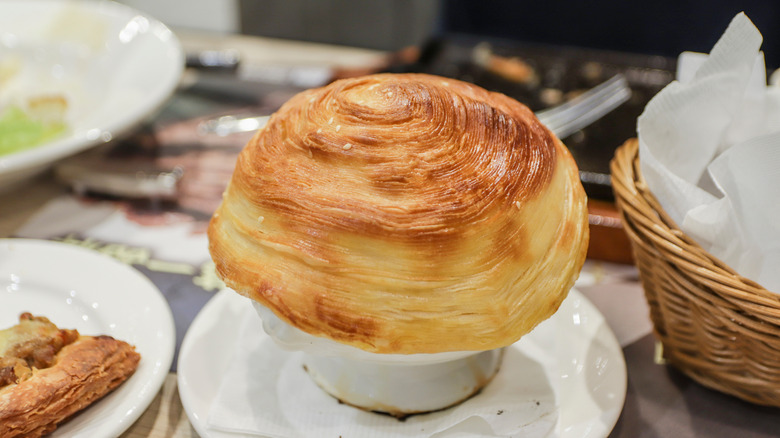 soup topped with puff pastry