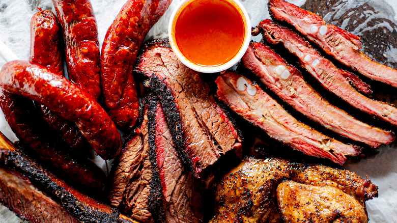 barbecue meat assortment and sauce