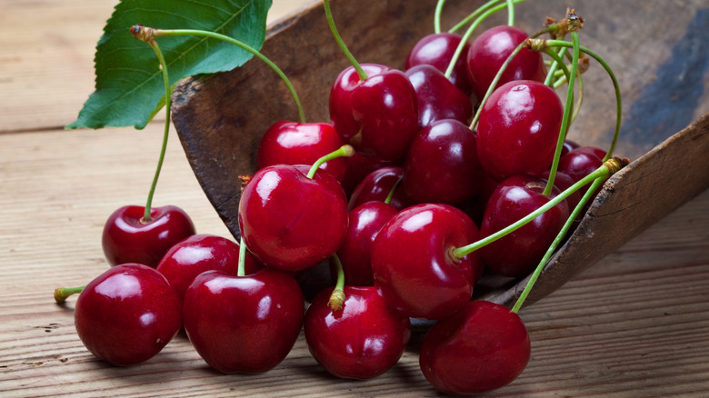 cherries on wooden table