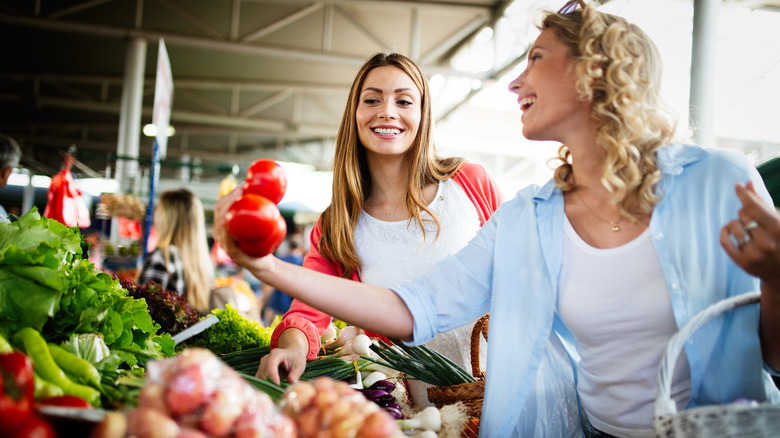 women shopping at farmers market