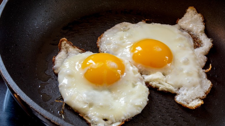 Two fried eggs in skillet