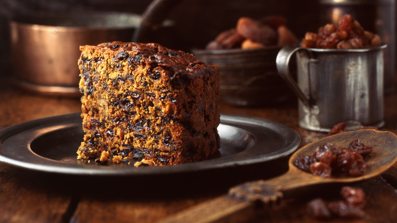 a slice of aged fruitcake on plate