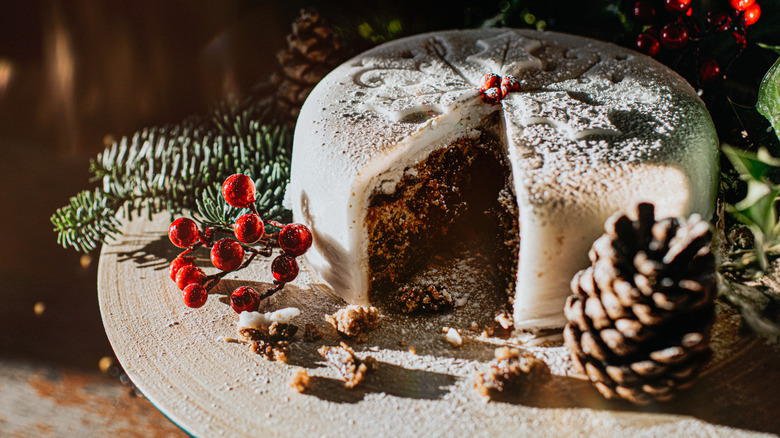 a fruitcake with a layer of icing