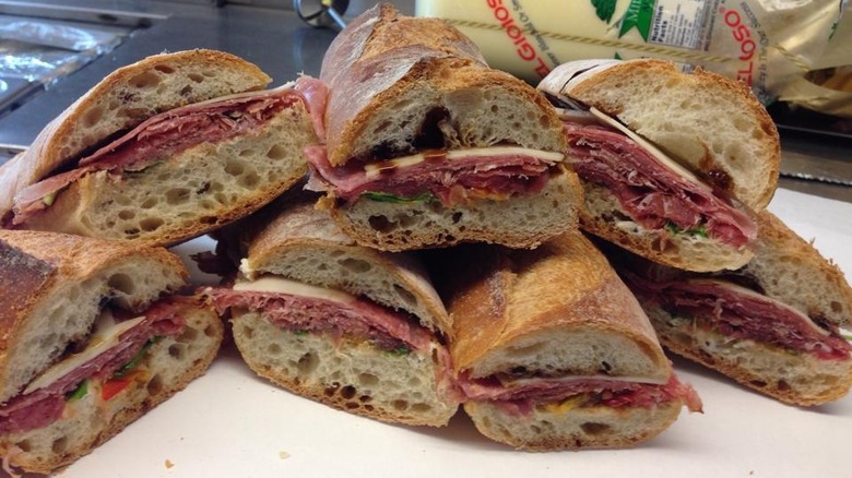 Fresh deli sandwiches in pile