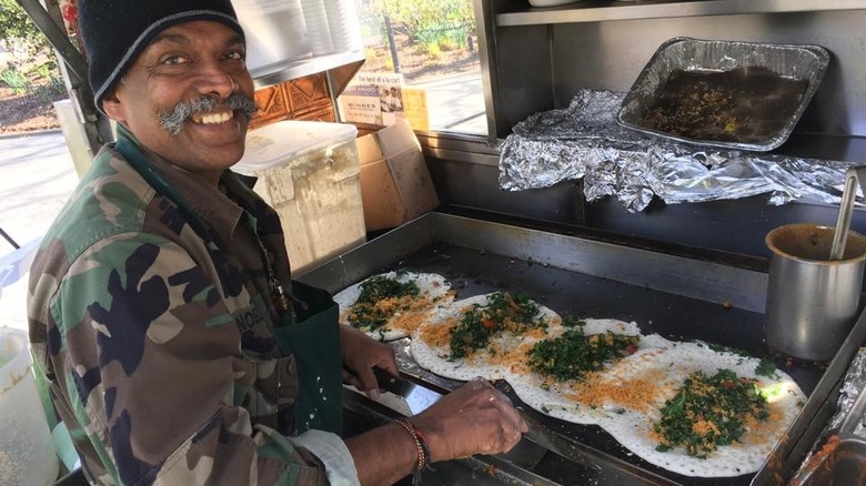 NY Dosas chef cooking savory crepes