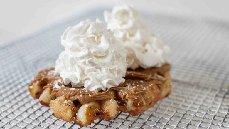 Waffle topped with whipped cream