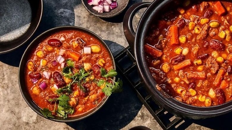 Bowls of chili with garnish